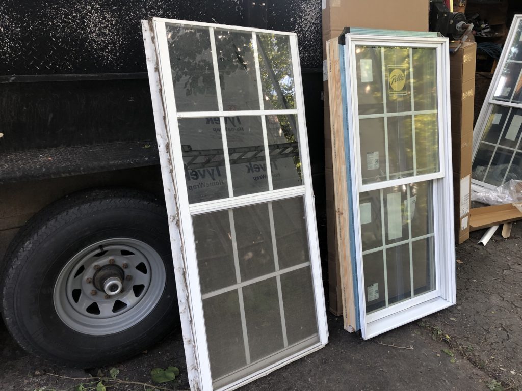 The old window on the left, the new Pella window on the right.